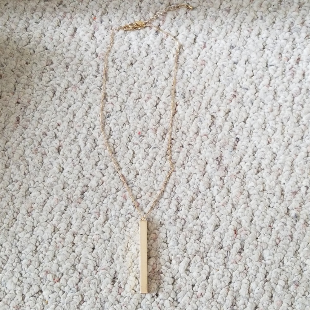 Gold colored necklace